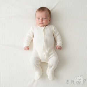 Marshmallow Ribbed Sleepsuit – by Soft Touch (Newborn–3 Months)